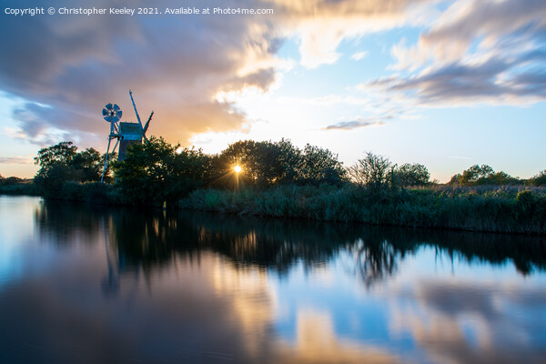 Norfolk Broads sunset Picture Board by Christopher Keeley