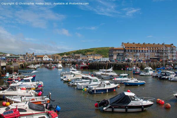 West Bay harbour, Dorset Picture Board by Christopher Keeley