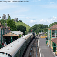 Buy canvas prints of Corfe Castle steam train by Christopher Keeley