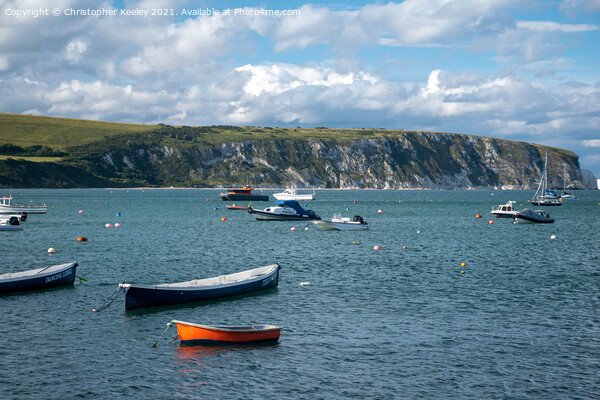 Boats in Swanage harbour Picture Board by Christopher Keeley