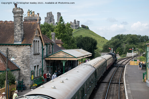 A steam train at Corfe Castle Picture Board by Christopher Keeley