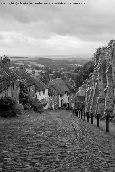 Gold Hill, Shaftesbury in monochrome Picture Board by Christopher Keeley