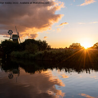 Buy canvas prints of Turf Fen windmill sunset by Christopher Keeley