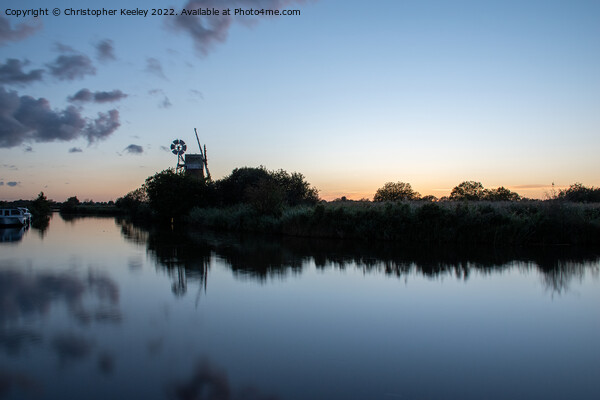 Dusk at Turf Fen windpump in the Norfolk Broads Picture Board by Christopher Keeley