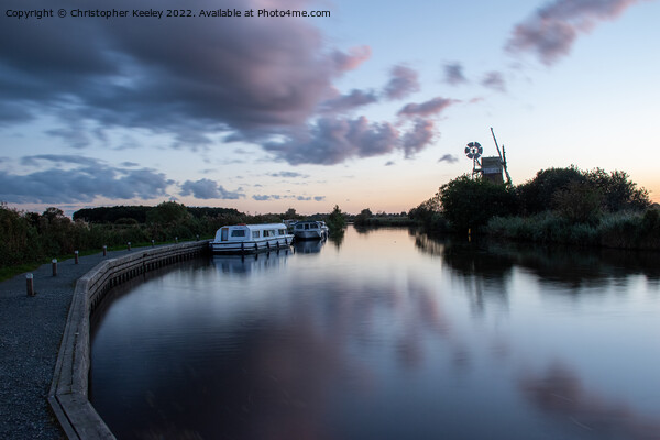 Dusk at Turf Fen windpump in the Norfolk Broads Picture Board by Christopher Keeley