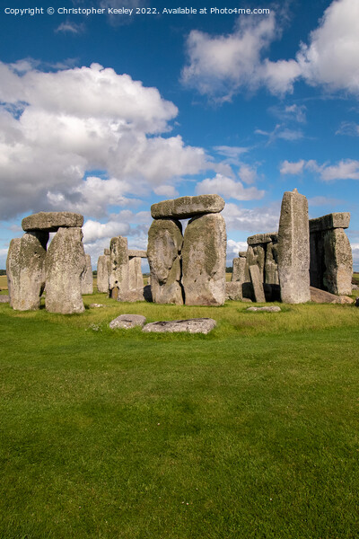 Blue skies over Stonehenge Picture Board by Christopher Keeley