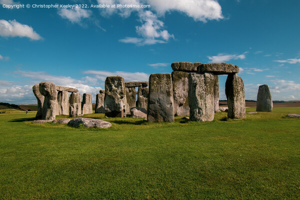 A sunny day at Stonehenge Picture Board by Christopher Keeley