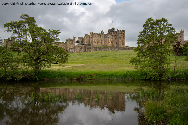 Reflections of Alnwick Castle Picture Board by Christopher Keeley