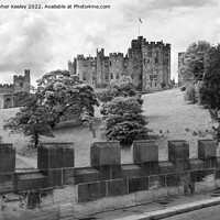 Buy canvas prints of Alnwick Castle in black and white by Christopher Keeley