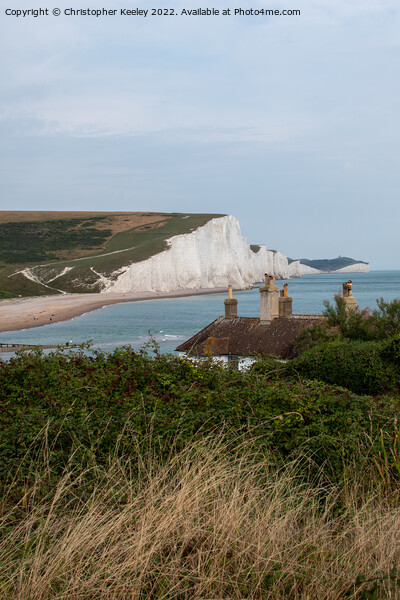 Seven Sisters Cliffs and coastguard cottages Picture Board by Christopher Keeley