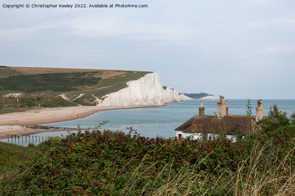 Coastguard cottages and Seven Sisters Cliffs Picture Board by Christopher Keeley