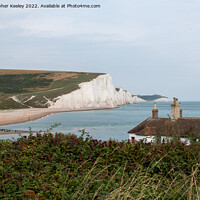 Buy canvas prints of Coastguard cottages and Seven Sisters Cliffs by Christopher Keeley