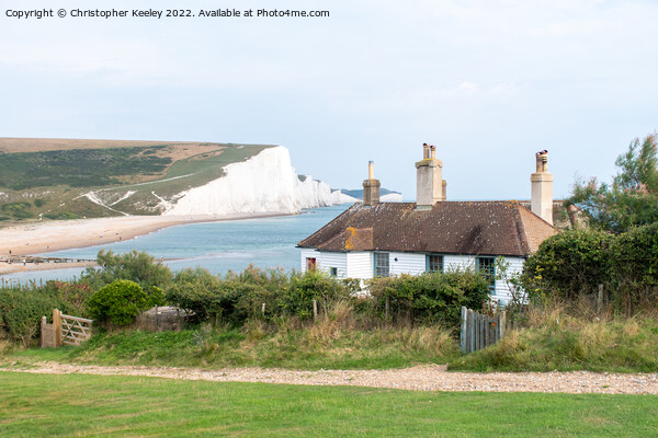 Seven Sisters Cliffs and coastguard cottage Picture Board by Christopher Keeley