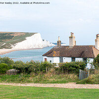 Buy canvas prints of Seven Sisters Cliffs and coastguard cottage by Christopher Keeley
