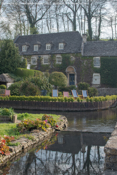 Cotswolds hotel and deck chairs in Bibury Picture Board by Christopher Keeley