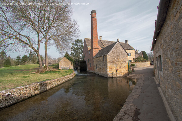 The Old Mill at Lower Slaughter in the Cotswolds Picture Board by Christopher Keeley