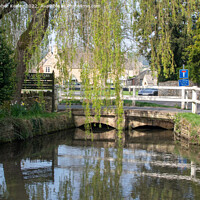 Buy canvas prints of Lower Slaughter Cotswolds village by Christopher Keeley