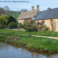 Buy canvas prints of Cotswolds village Upper Slaughter by Christopher Keeley