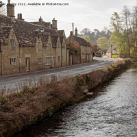 Buy canvas prints of Cotswolds cottages and River Coln in Bibury by Christopher Keeley