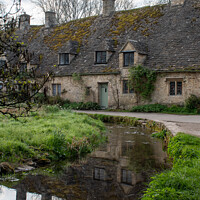 Buy canvas prints of Arlington Row cottages in Bibury, Cotswolds by Christopher Keeley