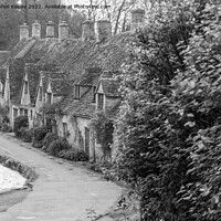 Buy canvas prints of Arlington Row, Bibury, in black and white by Christopher Keeley