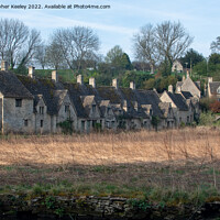 Buy canvas prints of Arlington Row cottages in the Cotswolds by Christopher Keeley