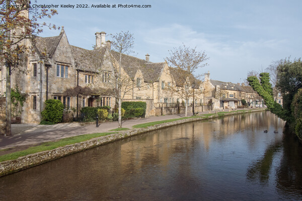 Row of cottages in Bourton-on-the-Water Picture Board by Christopher Keeley