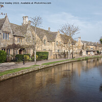 Buy canvas prints of Row of cottages in Bourton-on-the-Water by Christopher Keeley
