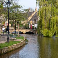 Buy canvas prints of By the river in Bourton-on-the-Water by Christopher Keeley
