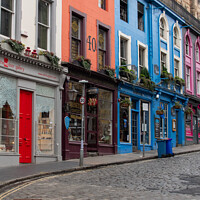 Buy canvas prints of Row of colourful shops on Victoria Street, Edinburgh by Christopher Keeley