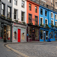 Buy canvas prints of Historic Victoria Street and colourful shop fronts in Edinburgh by Christopher Keeley