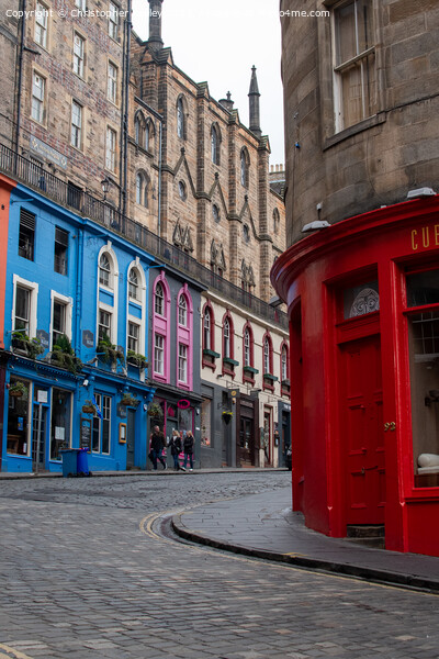 Colourful shops on the historic Victoria Street in Edinburgh Picture Board by Christopher Keeley