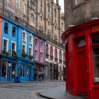 Buy canvas prints of Colourful shops on the historic Victoria Street in Edinburgh by Christopher Keeley