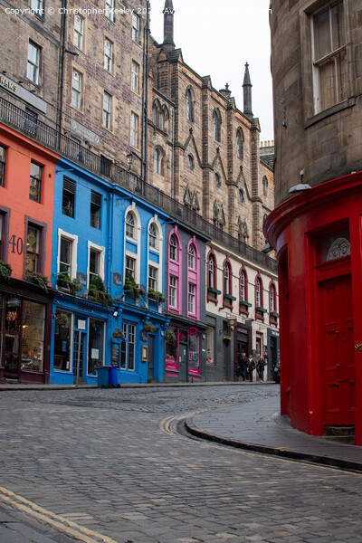 Looking onto Victoria Street, 'Diagon Alley', in Edinburgh city centre Picture Board by Christopher Keeley