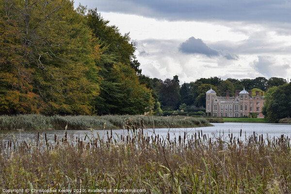 Blickling Hall from across the lake Picture Board by Christopher Keeley