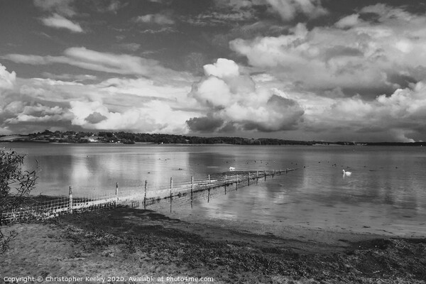 Cloudy skies over Rutland Water Picture Board by Christopher Keeley