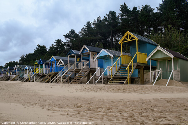 Wells beach huts Picture Board by Christopher Keeley