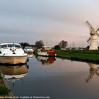Buy canvas prints of Dawn at Thurne mill by Christopher Keeley