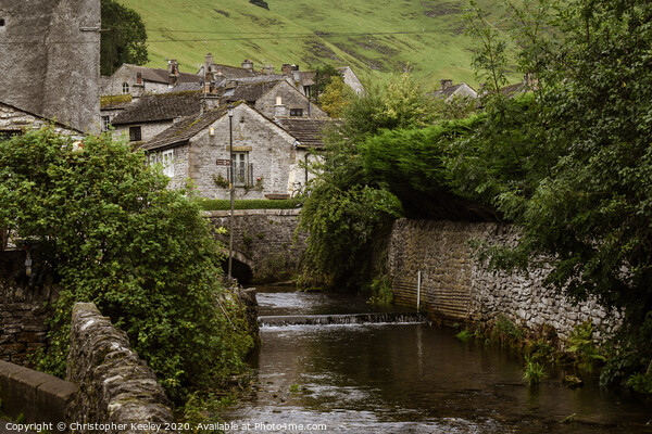 Castleton stream and cottages Picture Board by Christopher Keeley