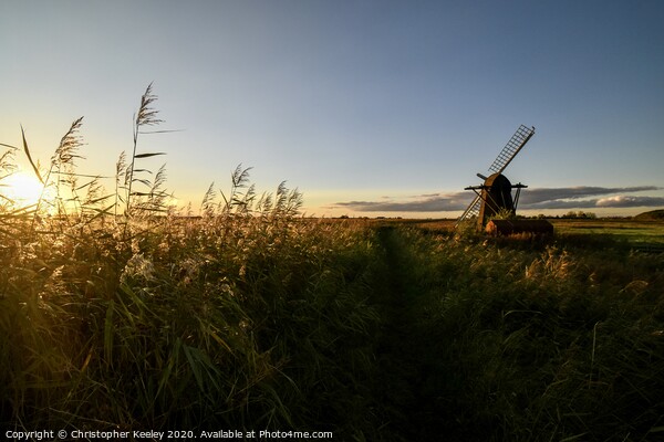 Golden hour at Herringfleet Windmill Picture Board by Christopher Keeley