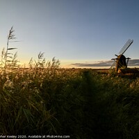 Buy canvas prints of Golden hour at Herringfleet Windmill by Christopher Keeley