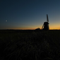 Buy canvas prints of Sunset over Herringfleet Windmill  by Christopher Keeley
