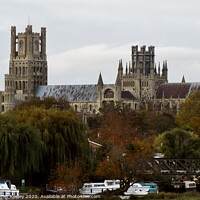 Buy canvas prints of Autumn colours at Ely Cathedral by Christopher Keeley