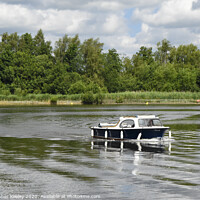 Buy canvas prints of Boating on the Norfolk Broads by Christopher Keeley