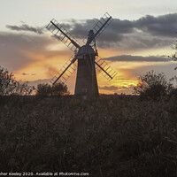 Buy canvas prints of Norfolk windmill sunset by Christopher Keeley