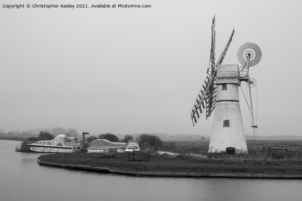 Black and white Thurne Mill Picture Board by Christopher Keeley