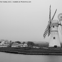 Buy canvas prints of Black and white Thurne Mill by Christopher Keeley