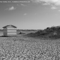 Buy canvas prints of Black and white Great Yarmouth beach huts, Norfolk by Christopher Keeley