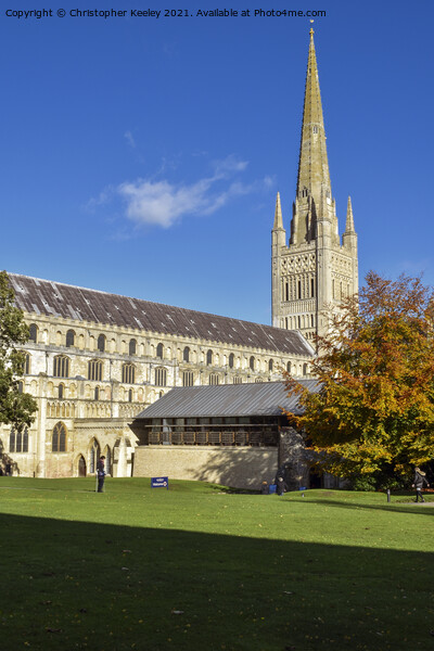 Sunny autumn day at Norwich Cathedral Picture Board by Christopher Keeley