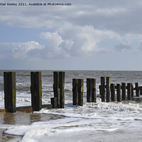 Buy canvas prints of Cloudy skies over Gorleston beach by Christopher Keeley